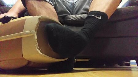 Schwarze Nike-Socken staubsaugen